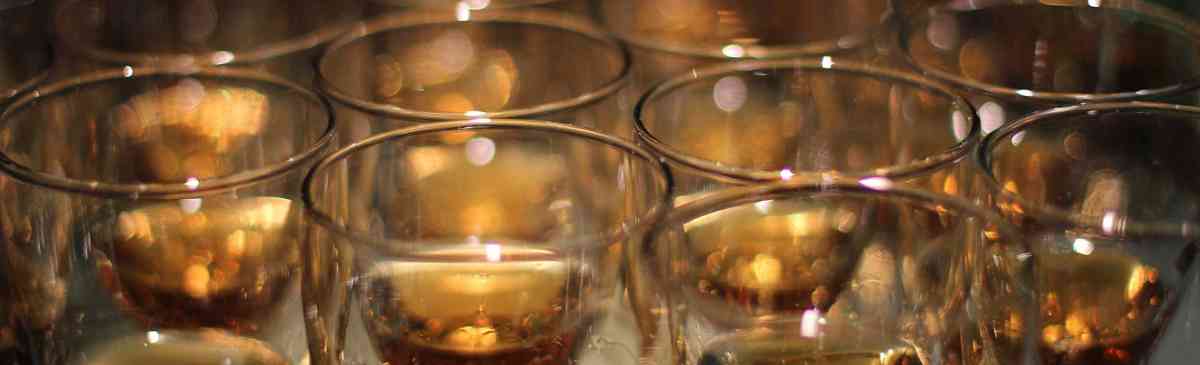 Glasses filled with whisky for a whisky tasting.