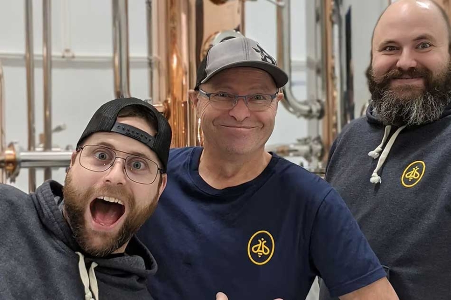 Happy staff at the Miellerie King Distillery.