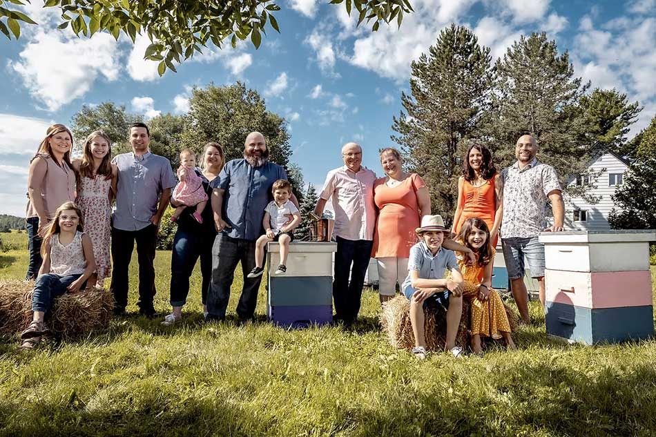 Staff and family at the Miellerie King Distillery.