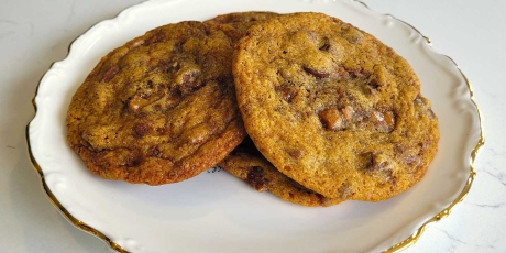 Brown Butter Bourbon Toffee Chocolate Chip Cookies on a plate.