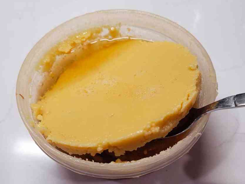 Hardened butter on top of whiskey from the freeser.