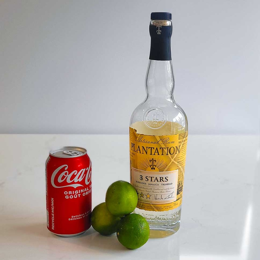 The Cuba Libre ingredients - rum, Coke, and fresh lime juice.